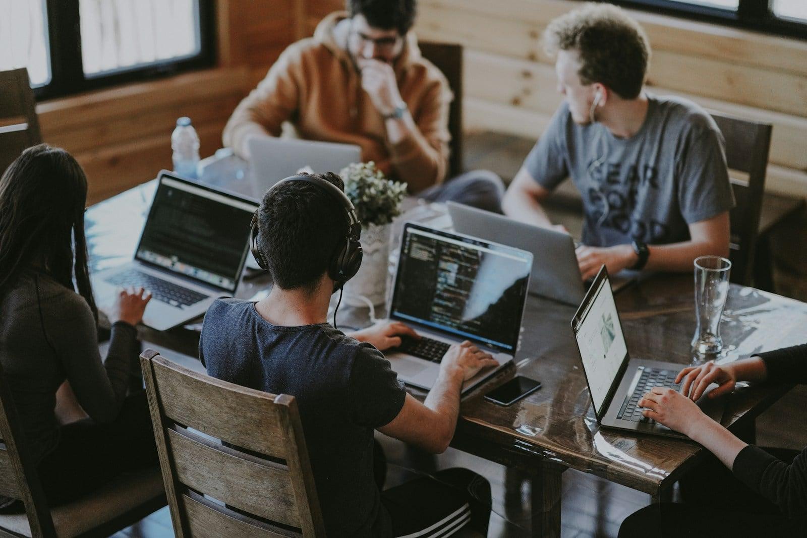 Diverse team collaborating on AI customer support platform