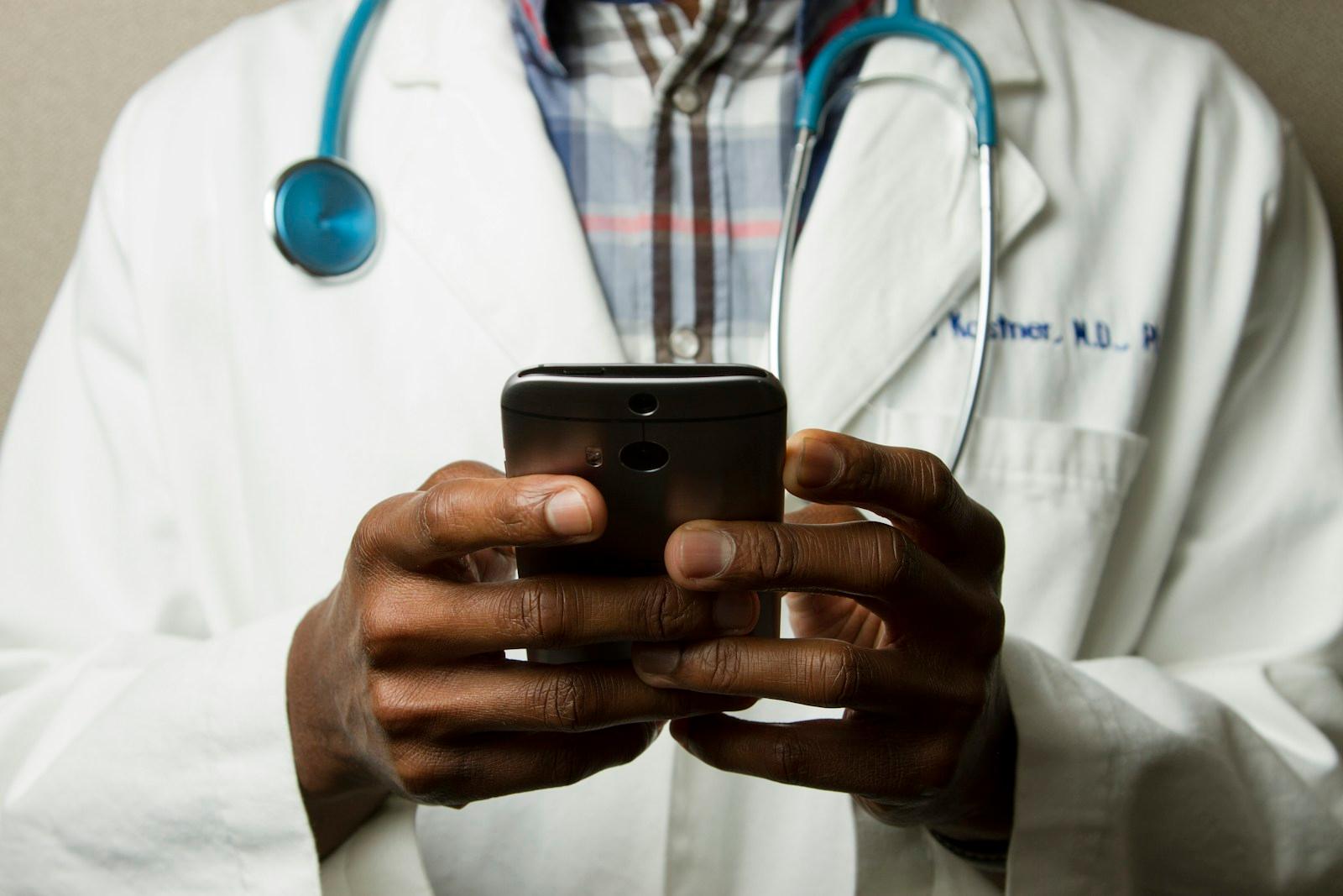 Healthcare professional with digital patient communication