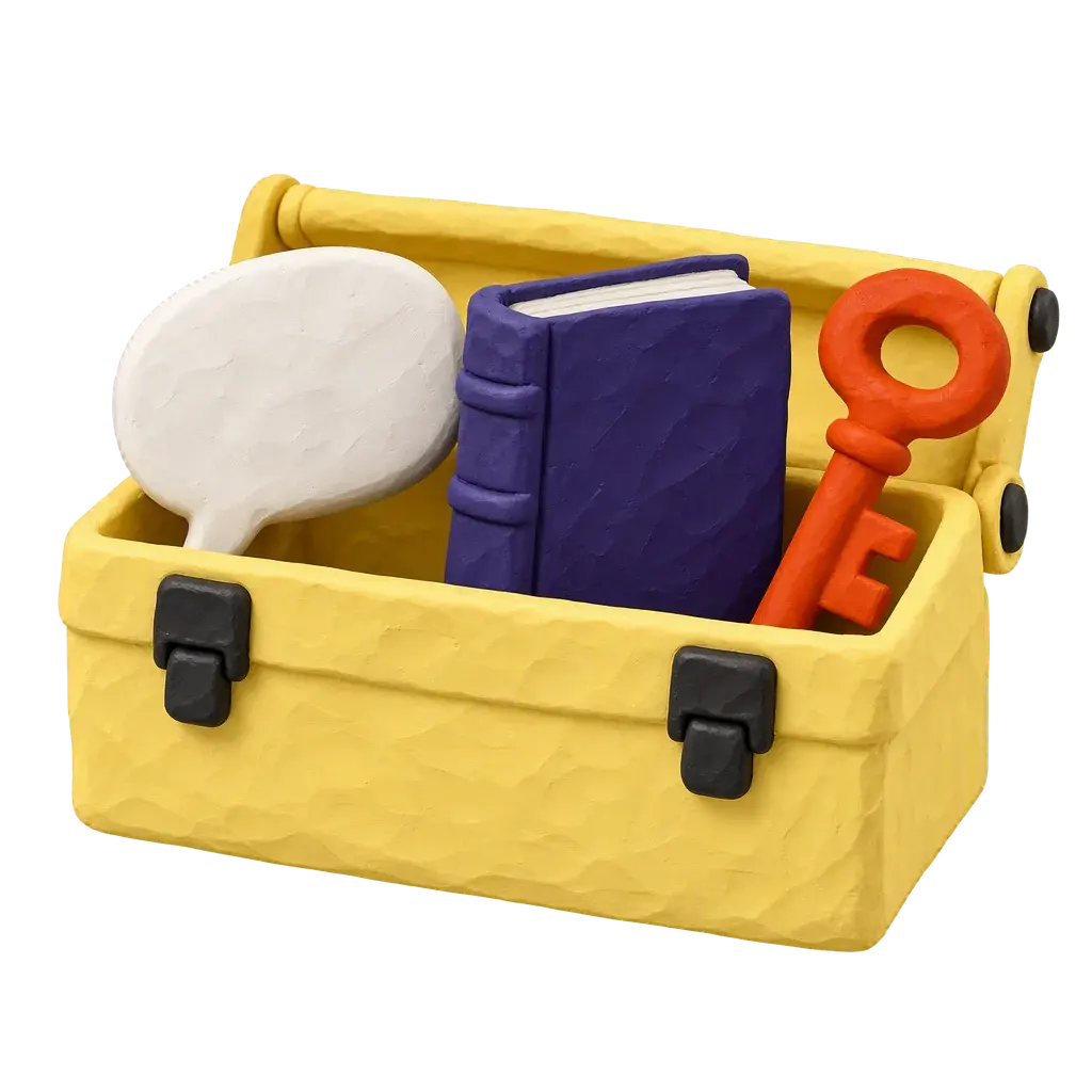 A handmade clay toolbox holding a speech bubble, a book and a key